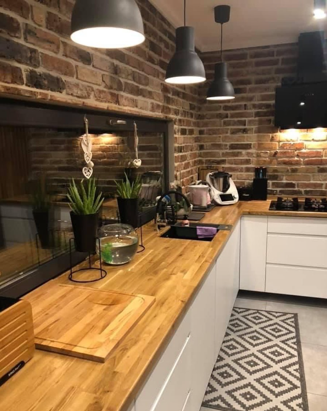 Bespoke solid oak worktops and exposed brick kitchen fit-out